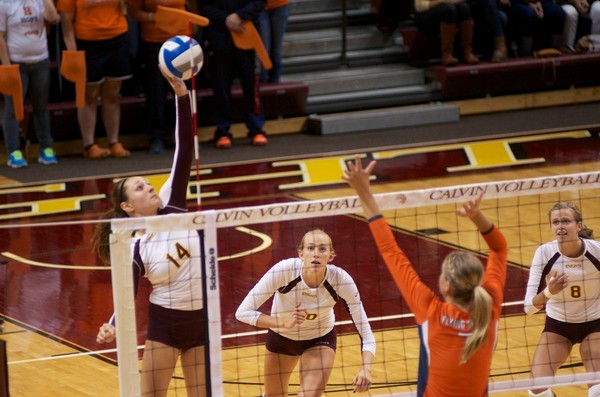 Megan Korber, Megan Rietema and Kristen Zietse ready themselves for a kill.  Calvin.edu