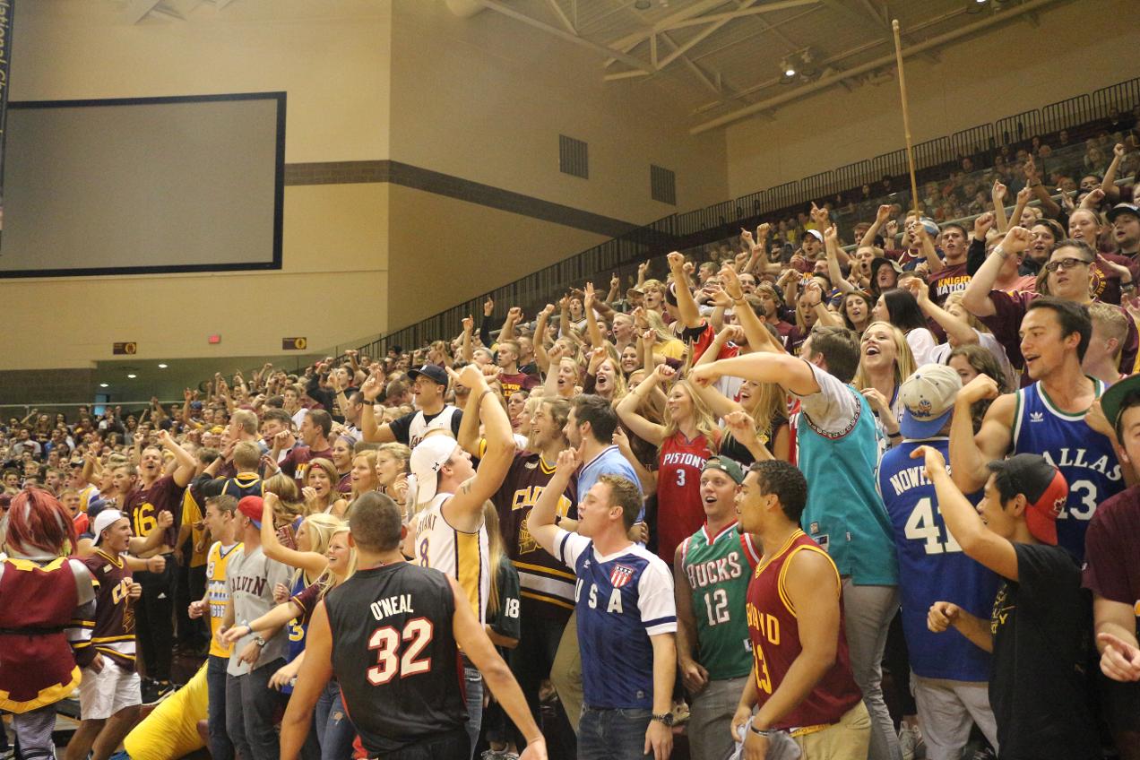Students cheer Calvin’s volleyball team in a show of school spirit.