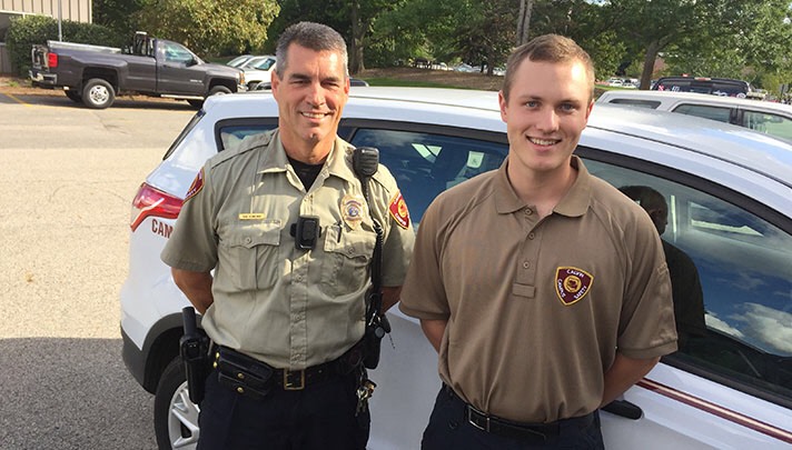 One of our full time employees (Ron Venneman) along with a student employee (Josh Kuperus). Photo courtesy Campus Safety.