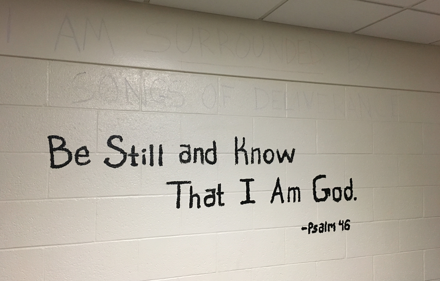 A Bible verse painted on the wall of a BHT prayer room.