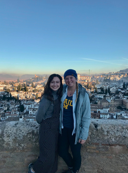 Nicole VanderYacht, right, with another student overlooking the city of Granada, Spain