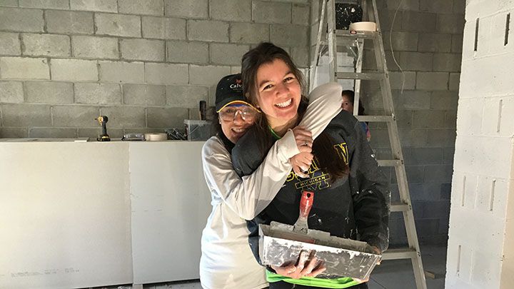Two Students on a spring break trip through the service learning center.