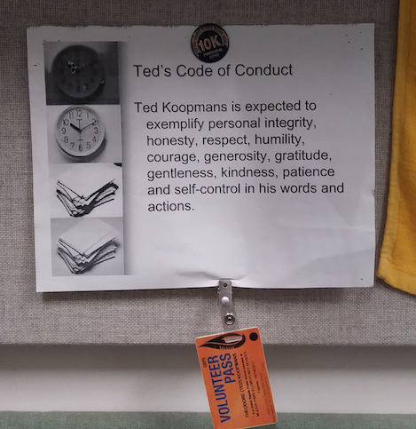 Ted Koopmans, Calvins former head of building services, displayed a code of conduct in his office.