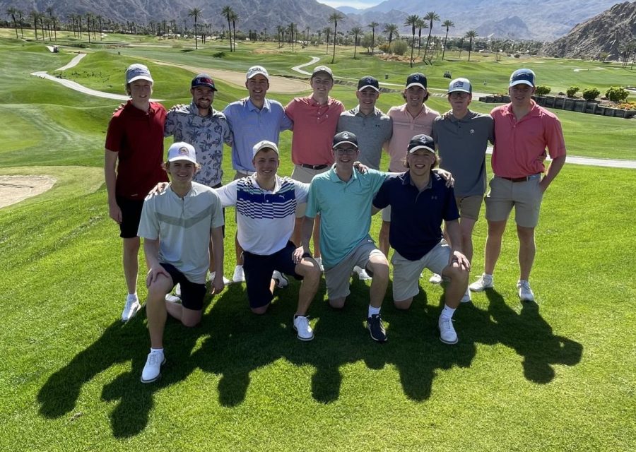 Mens+golf+on+the+sunny+golf+course+of+Palm+Desert.
