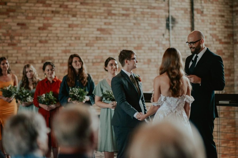 Calvin social work professor Joe Kuilema officiated Annica and Nicole Sweda’s wedding in October 2021. The couple’s relationship was at the heart of the Center for Social Research’s split with Calvin. (Photo courtesy Nicole Sweda)