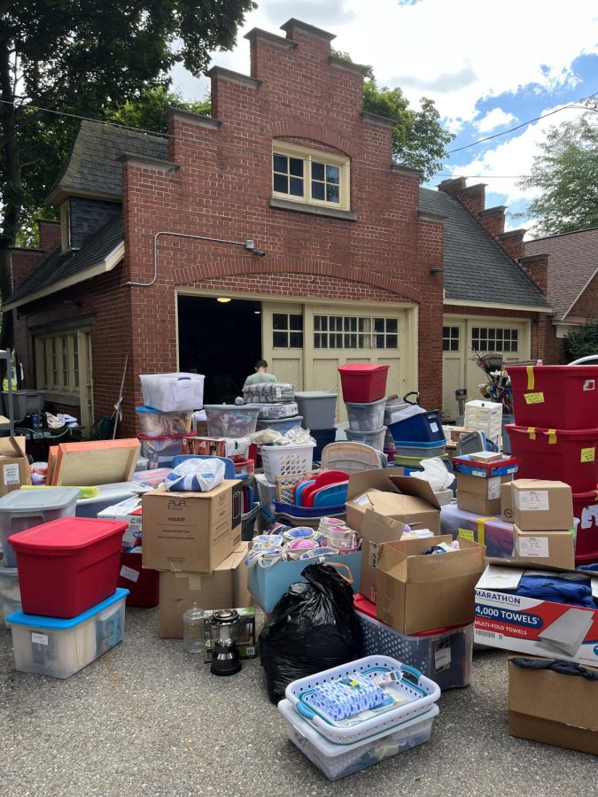 Students organize a garage at the YWCA of Central West Michigan during Streetfest.