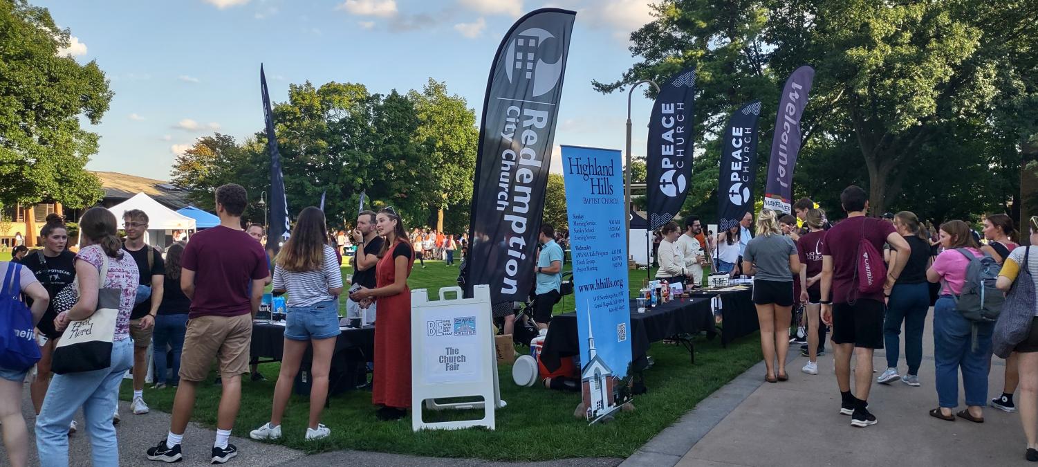 Students search for welcoming communities at annual church fair ...