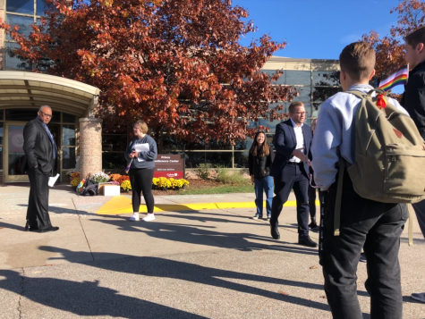 Students gathered outside the Prince Conference Center, where the Board of Trustees approved retaining all faculty with confessional difficulties last Friday.