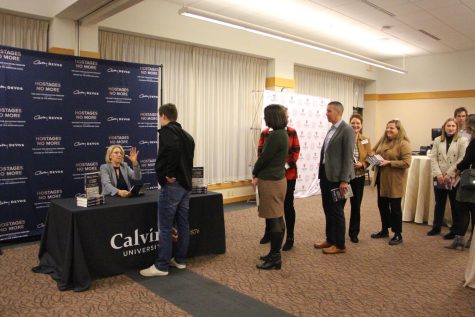 DeVos signed copies of her most recent book for Calvin community members at the Prince Conference Center on Nov. 17.