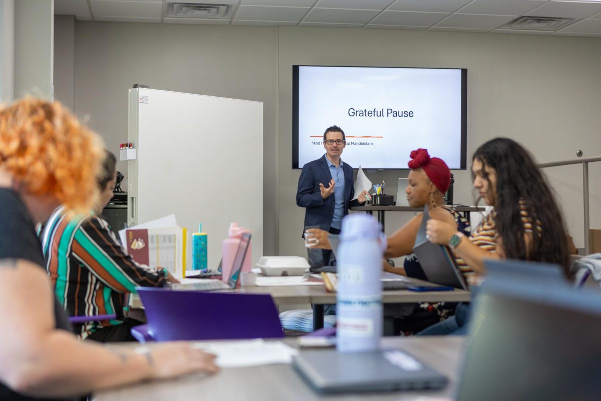 Professor Jason Stevens leads a class.