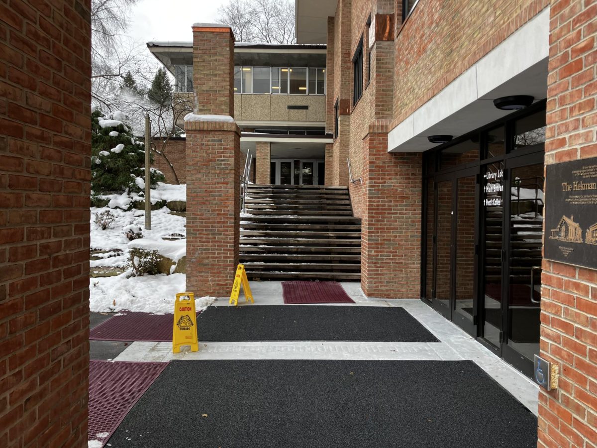 When wet, the concrete at the entrance to the Hekman Library becomes much more difficult to navigate for persons with disabilities.
