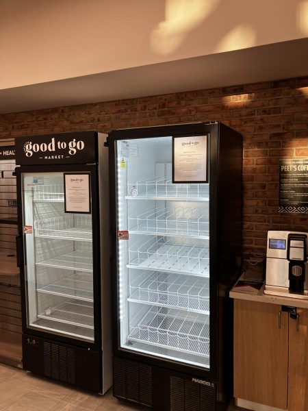 Refrigerators sit empty at the site of the former Grab and Go Market in DeVos Communication Center.