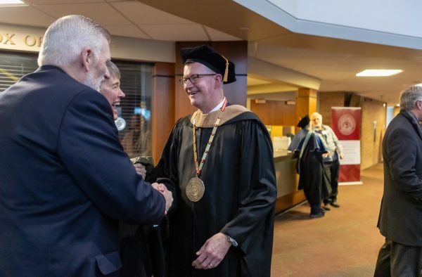 Elzinga greets attendees after his inauguration. Photo courtesy of calvin.edu. 